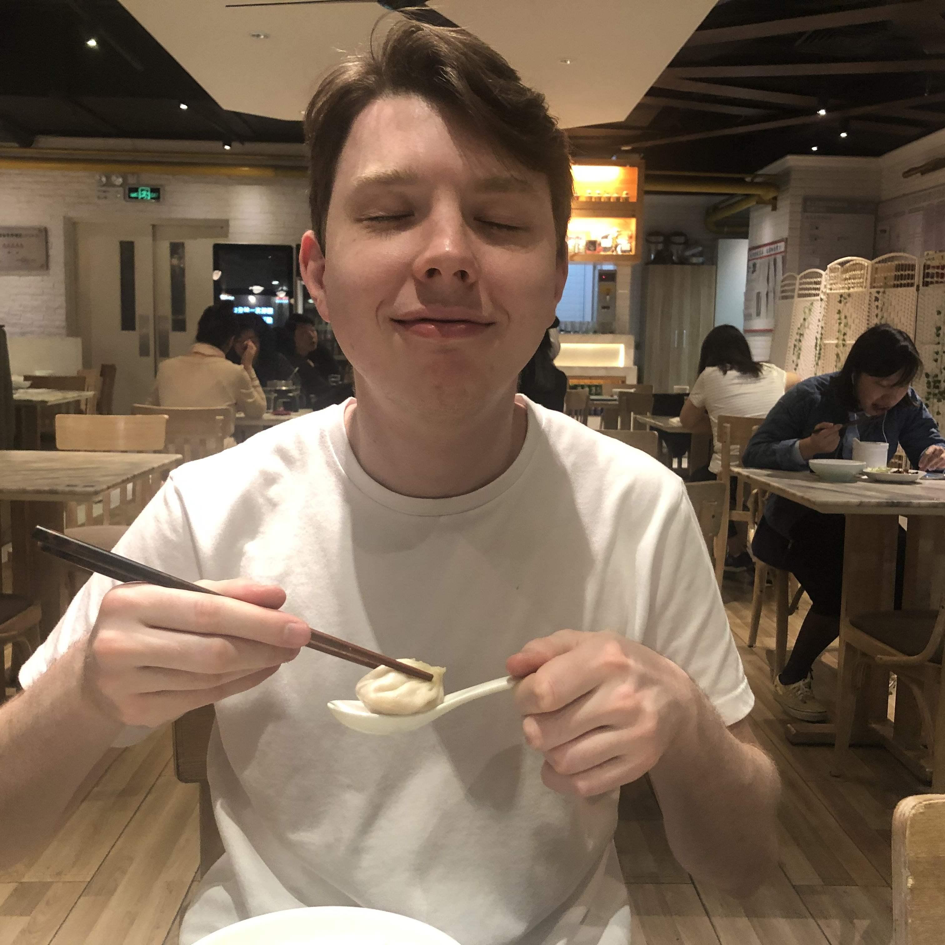We got a taste of each other's culture. Here is Mark eating Xiao Long Bao (Shanghai dumplings).