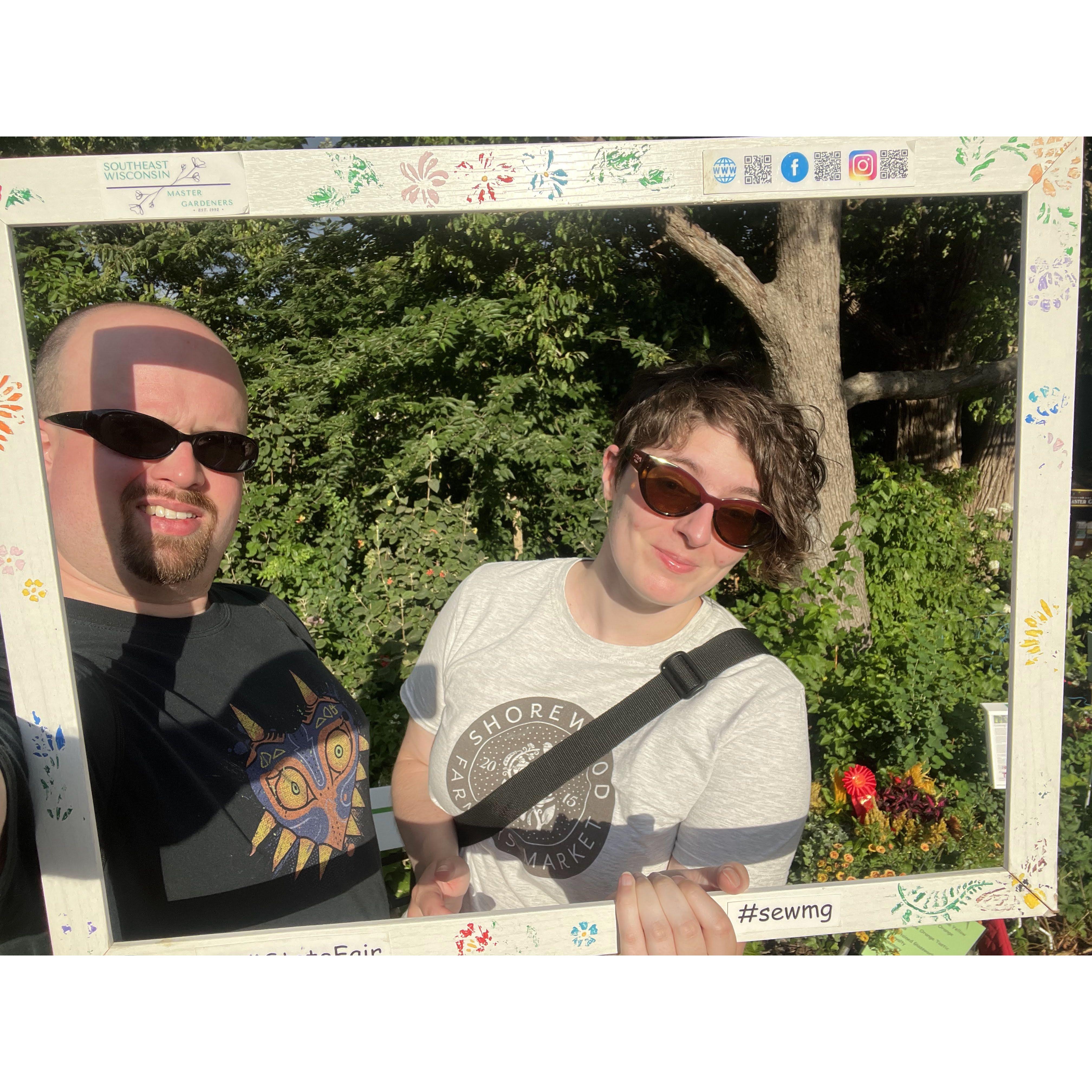Two plant enthusiasts enjoying themselves at the Wisconsin State Fair in the Horticultural section.