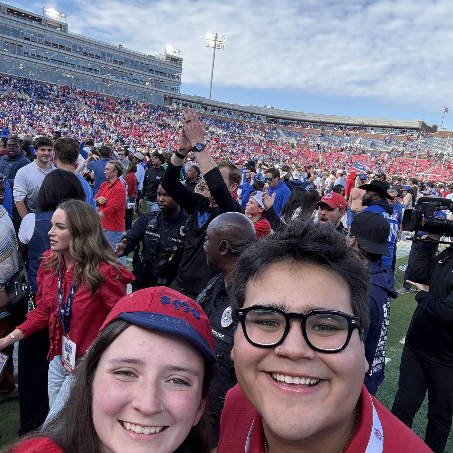 On the field after SMU upset the national champion runner-up Miami