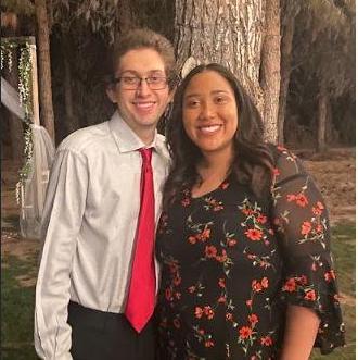 May 2021: Attending our 1st wedding together.