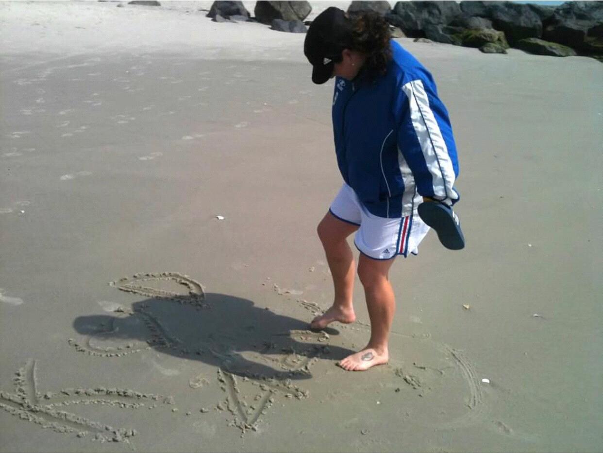 March 23, 2012 Long Beach, NY Deborah writing K+D 4ever in the sand