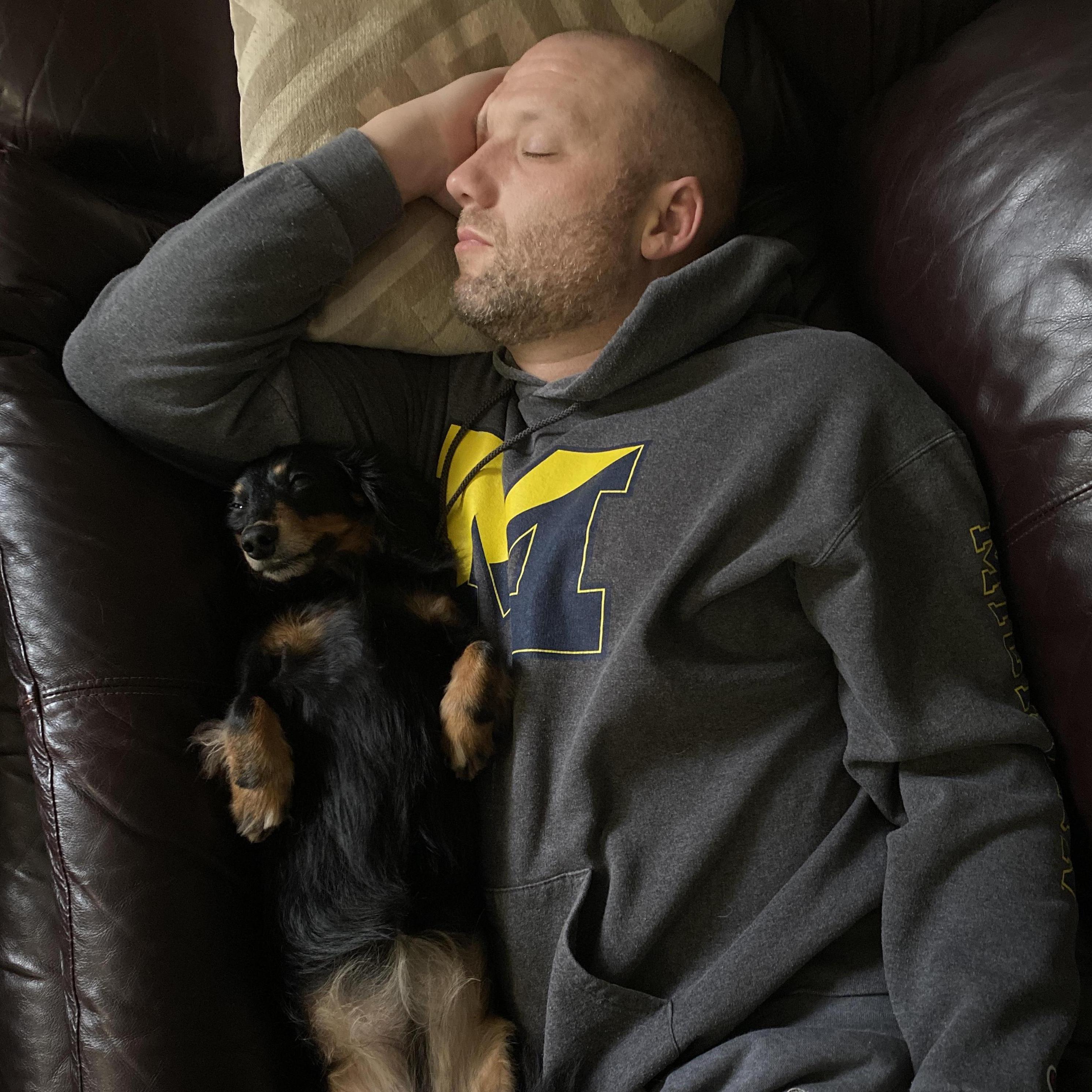 CoCo loves to snuggle with Jay.