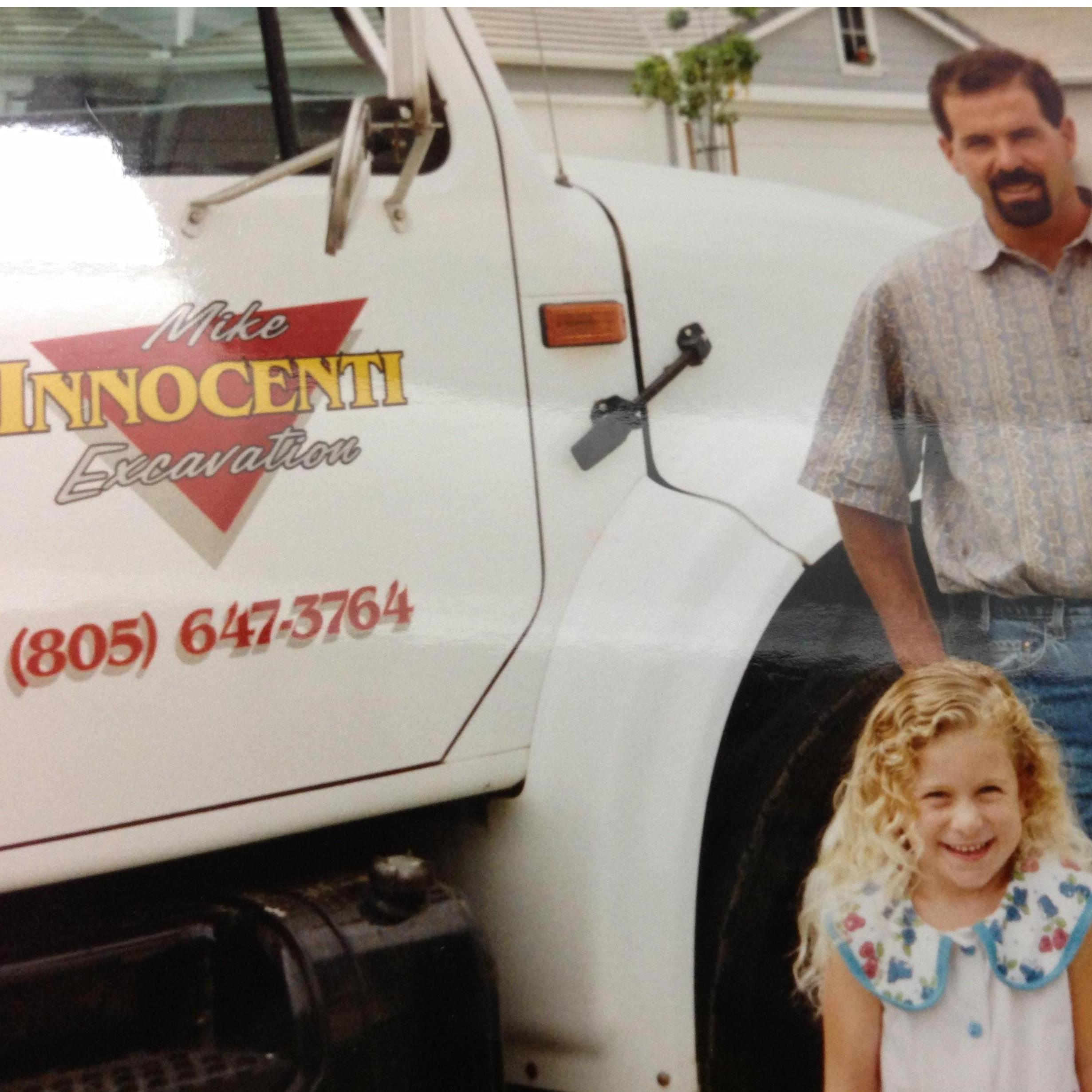 Lesley & Uncle Mike infront of the family buisness truck!