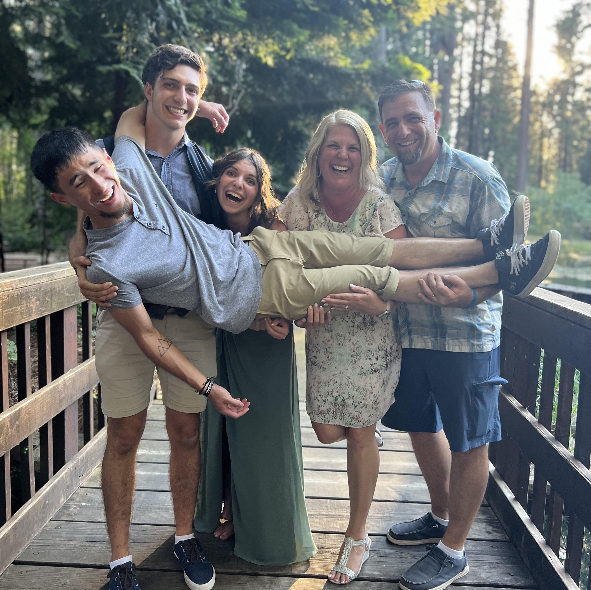 Max joining Bree's rambunctious family at her childhood friend Darci's wedding.