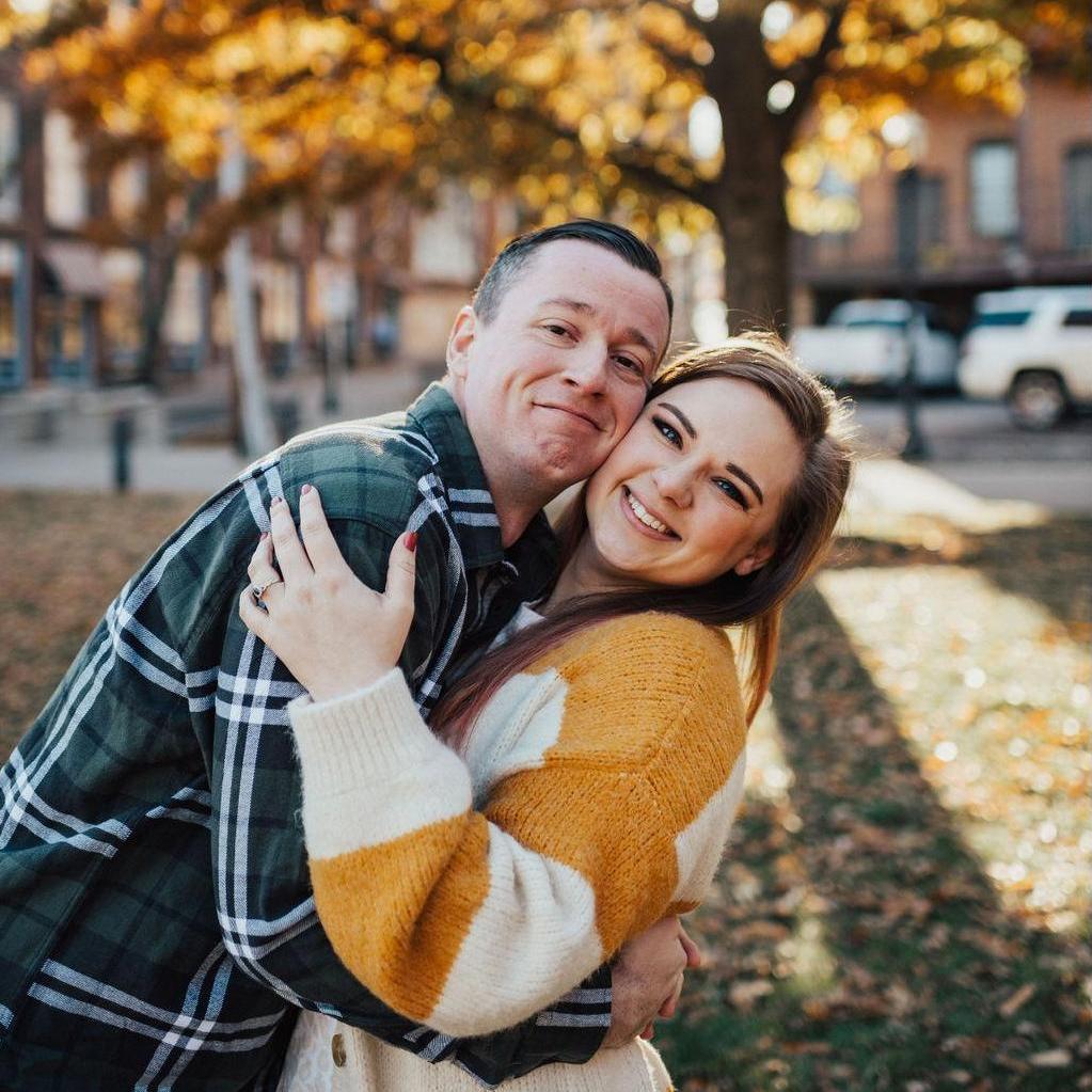 When your photographer says "touch cheeks," but there's a nine inch height difference lol.