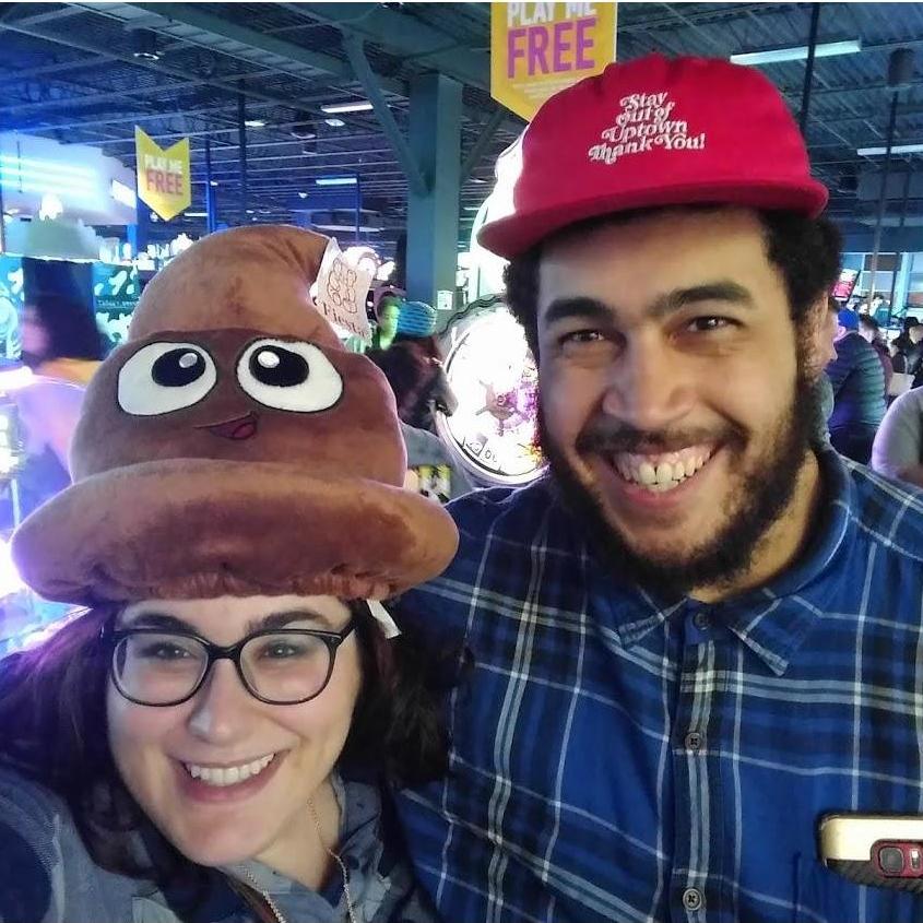 Chris won Monica the poop hat.