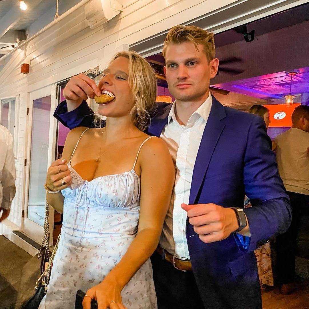 Classic Ev feeding Madison at JP & Erin Edes' wedding.