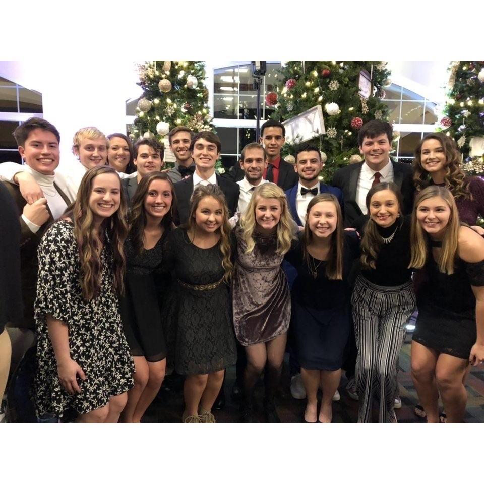 The tennis team all dressed up and spiffy at Miller Scott.