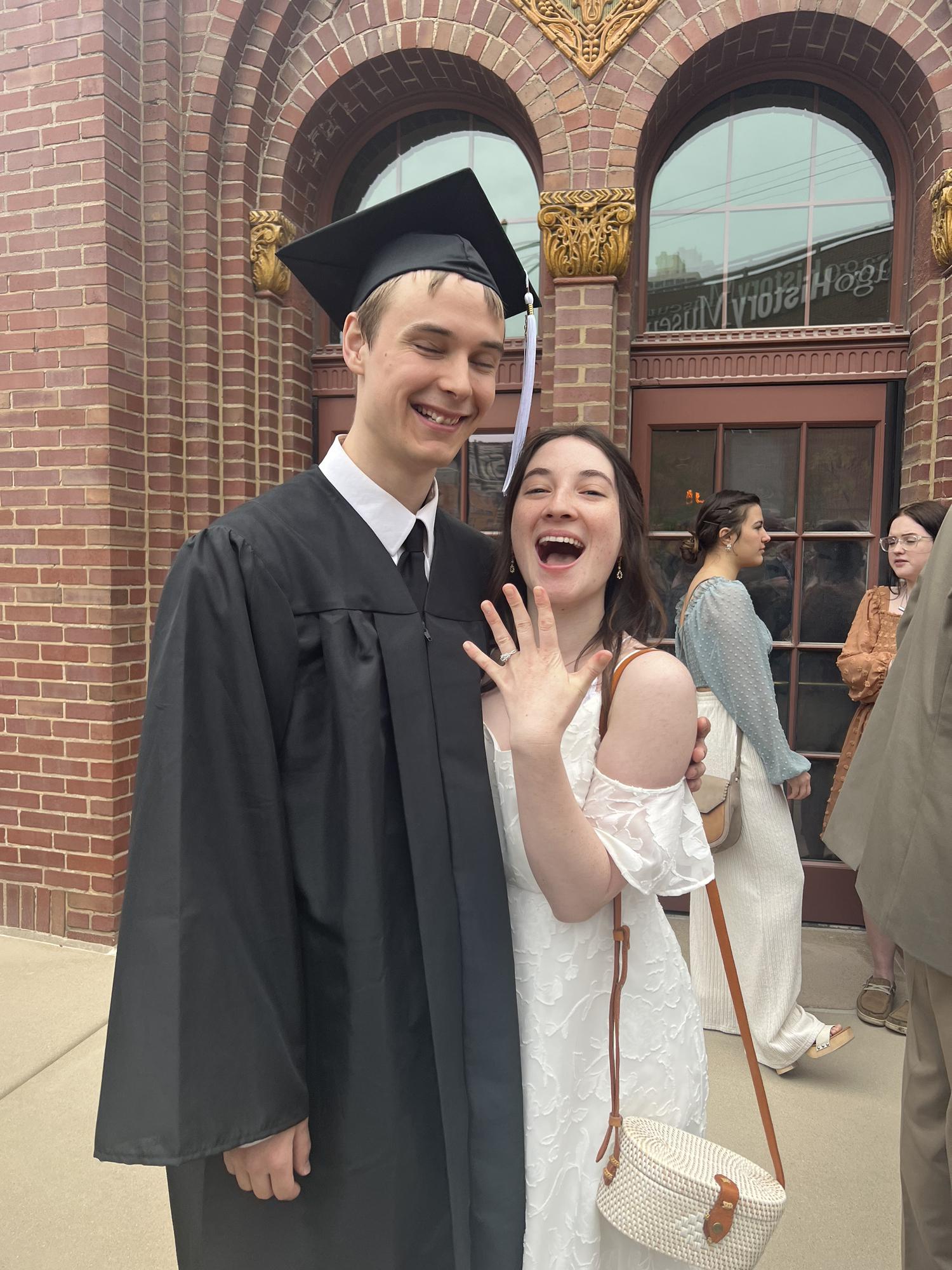 A week after engagement, Brett graduated.