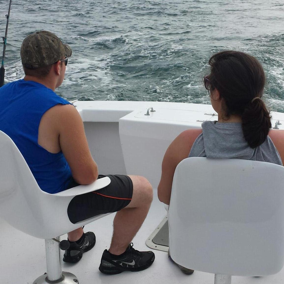 Summer 2014 only a few months into dating and our first vacation together. This photo was taken on a charter fishing trip with my dad and sisters.