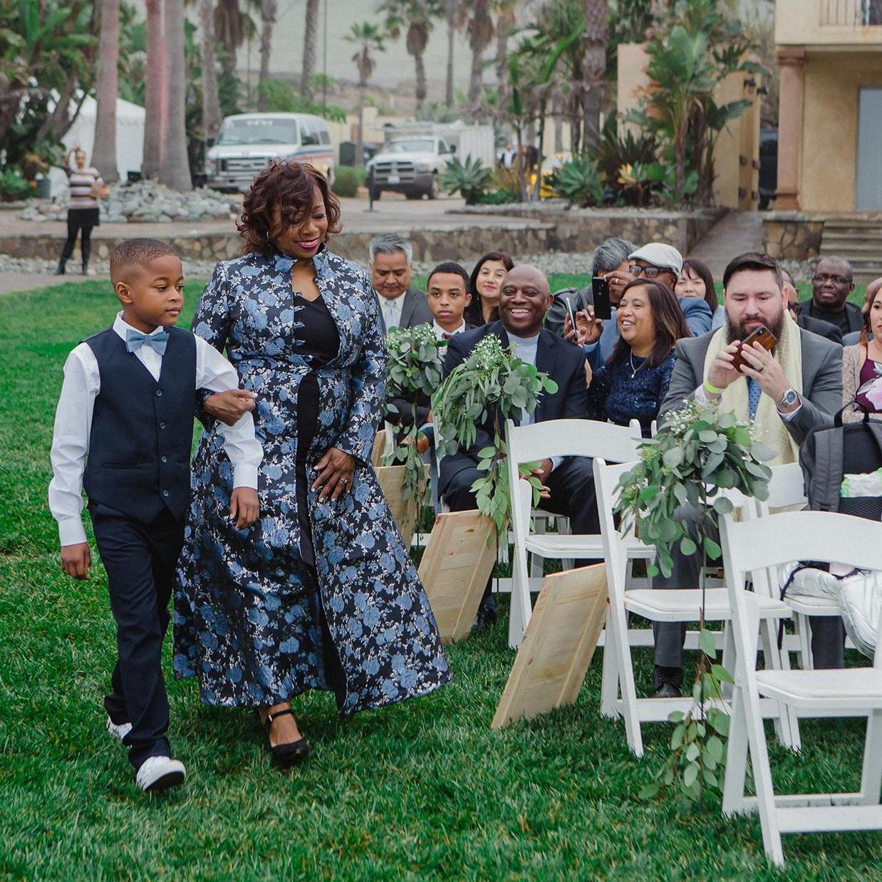Mother of the Bride ushered by Myles