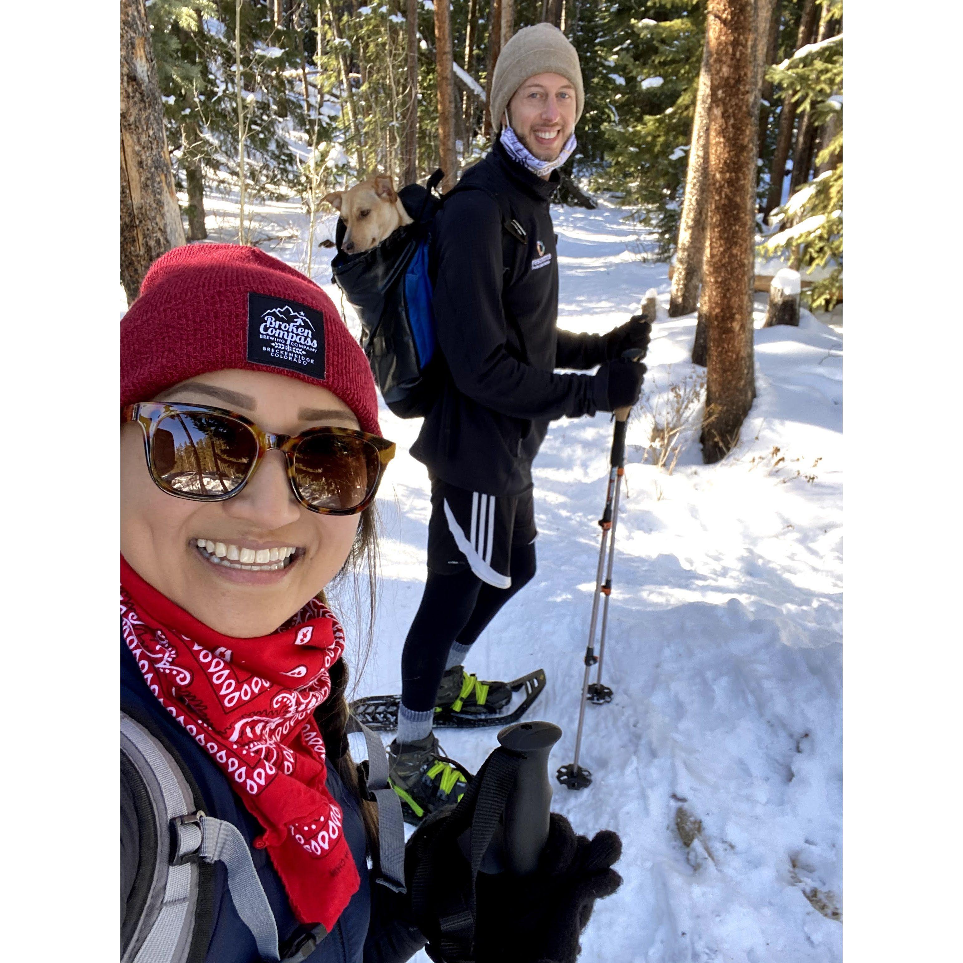One of our first dates: snowshoeing with Penny in a backpack.
