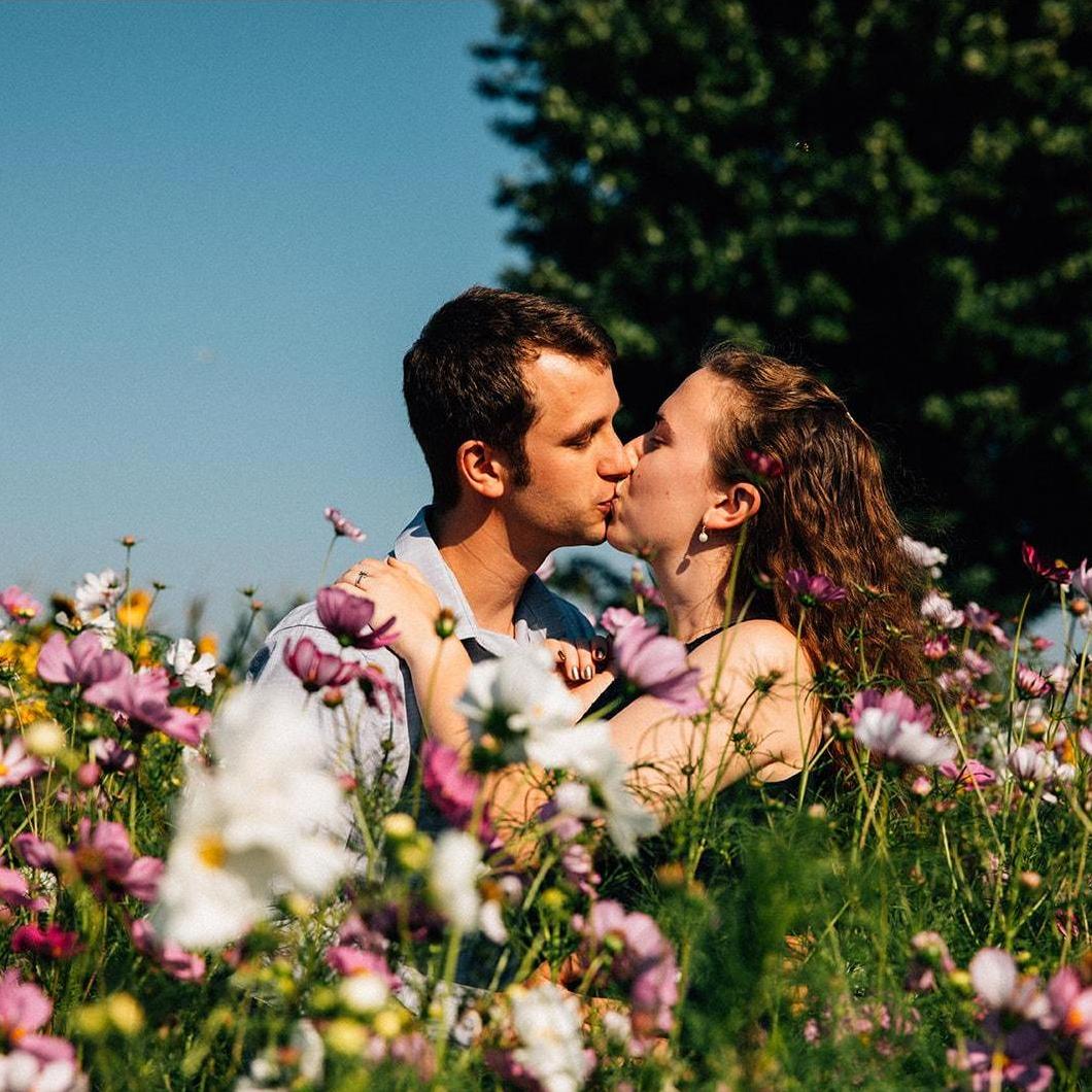 Engagement photoshoot with Zoe Burchard at Mountainview Blueberry Farm's sunflower festival