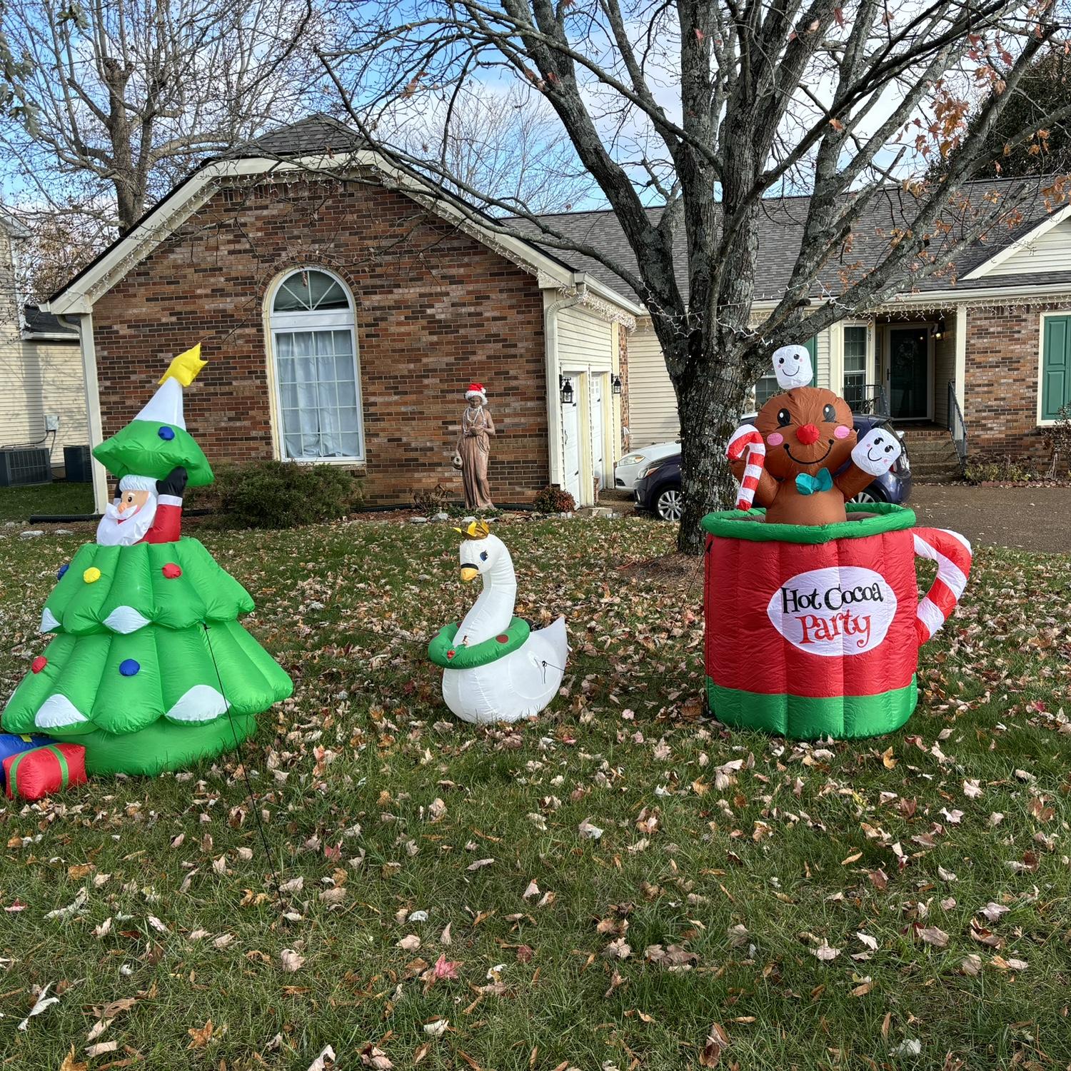 Our first Christmas in our house. We both love how fun blow ups are!