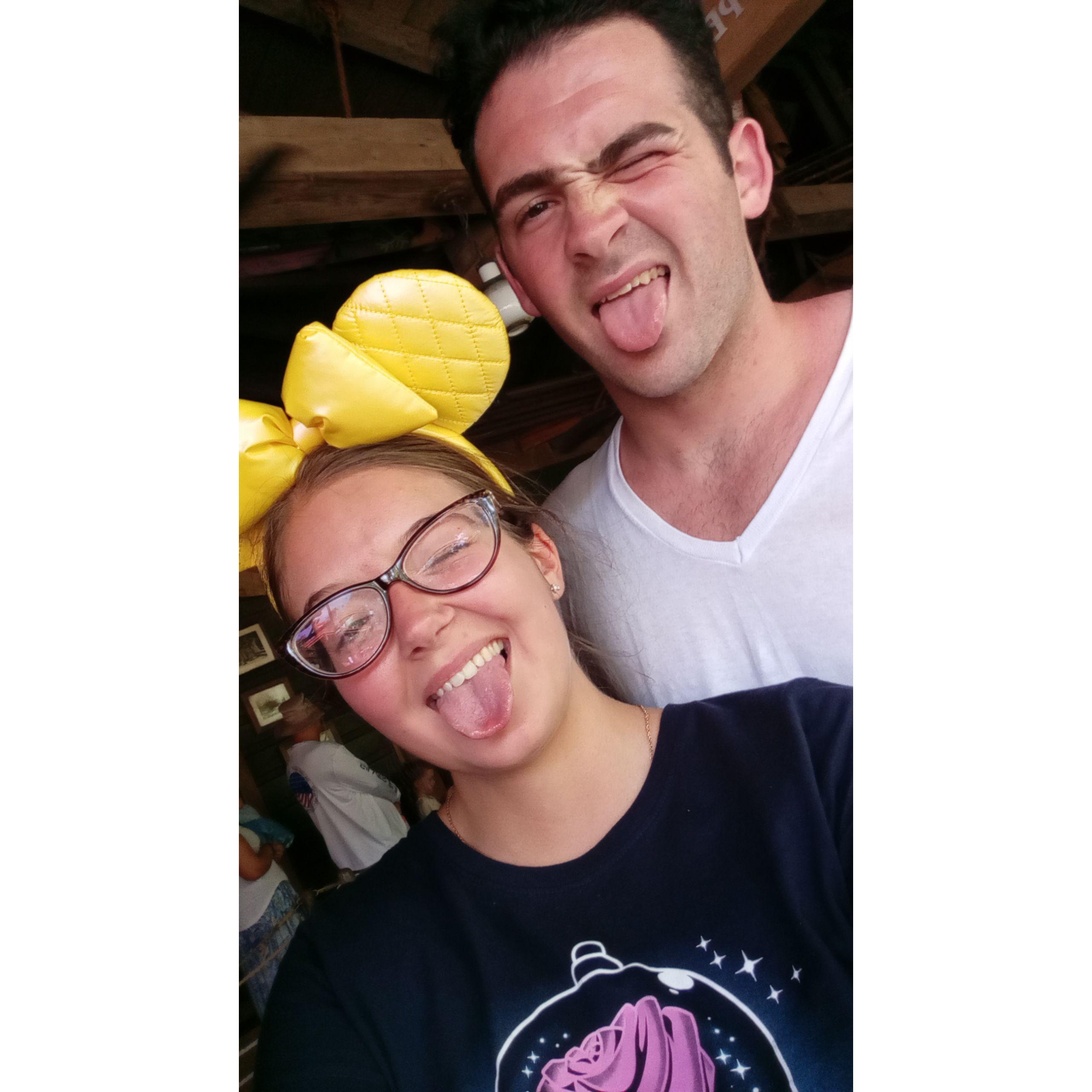 It was my first time in Florida and meeting Logan's family. We were at the Magic Kingdom at the ride called It's a small world after all.