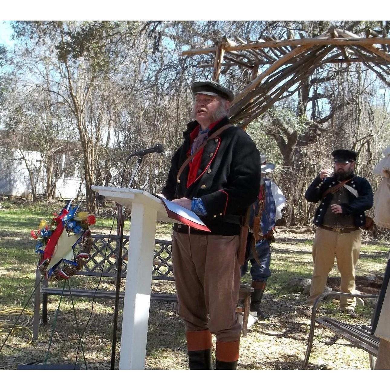 George reading the names of the Alamo Defenders at the Reembrace Ceremony 2021, Museum of Texas Handmade Furniture