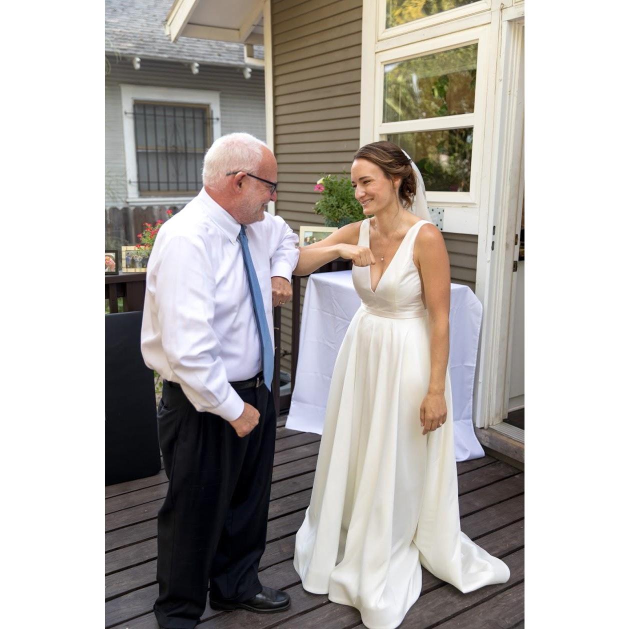 Rachel and her father, Mike, post "first look"