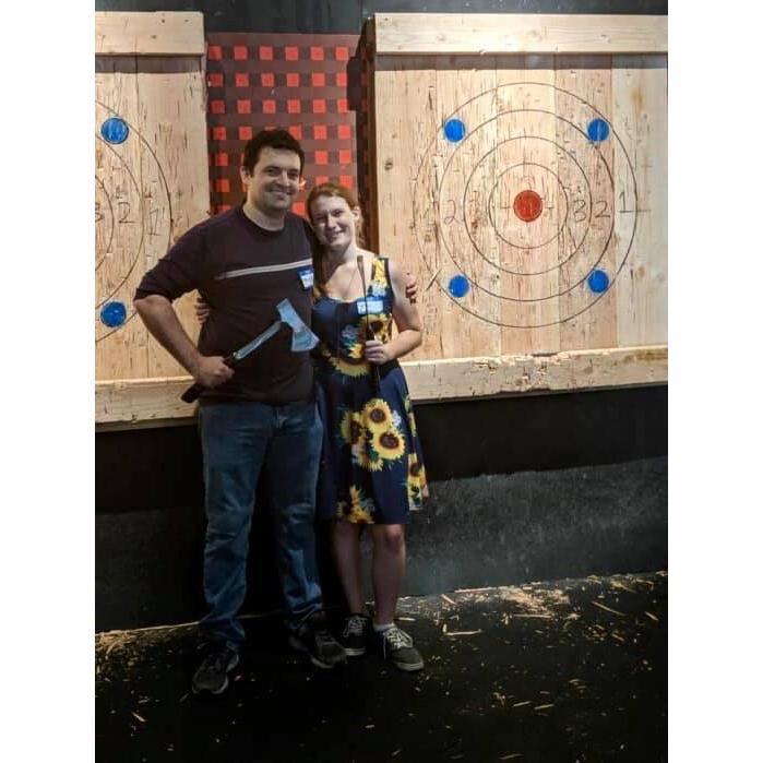 Our very first date! Ax throwing at Montana Nights Ax throwing in Newington. Note the sunflowers on my dress, hence our wedding flower choice!