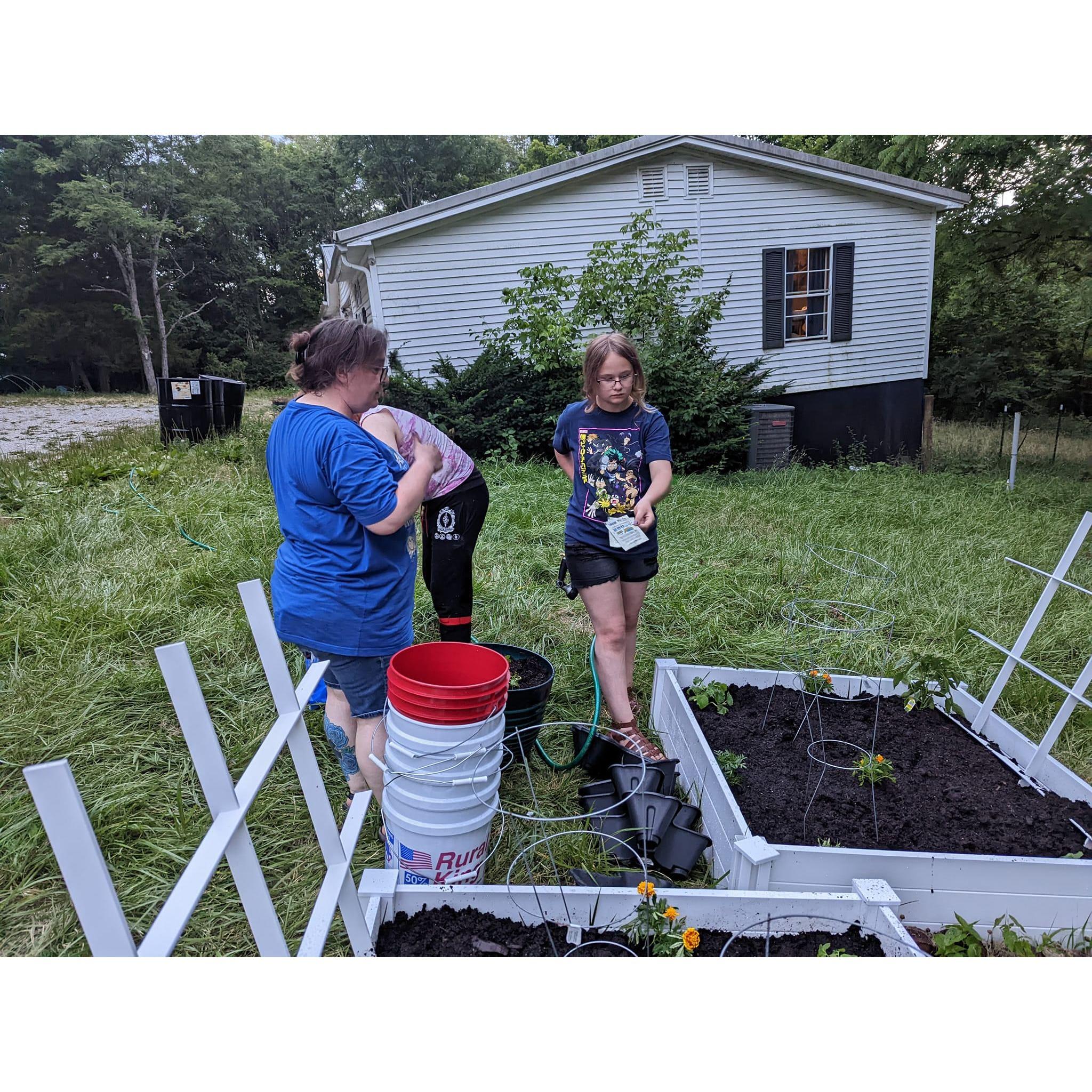 Teaching Maggie to Garden!