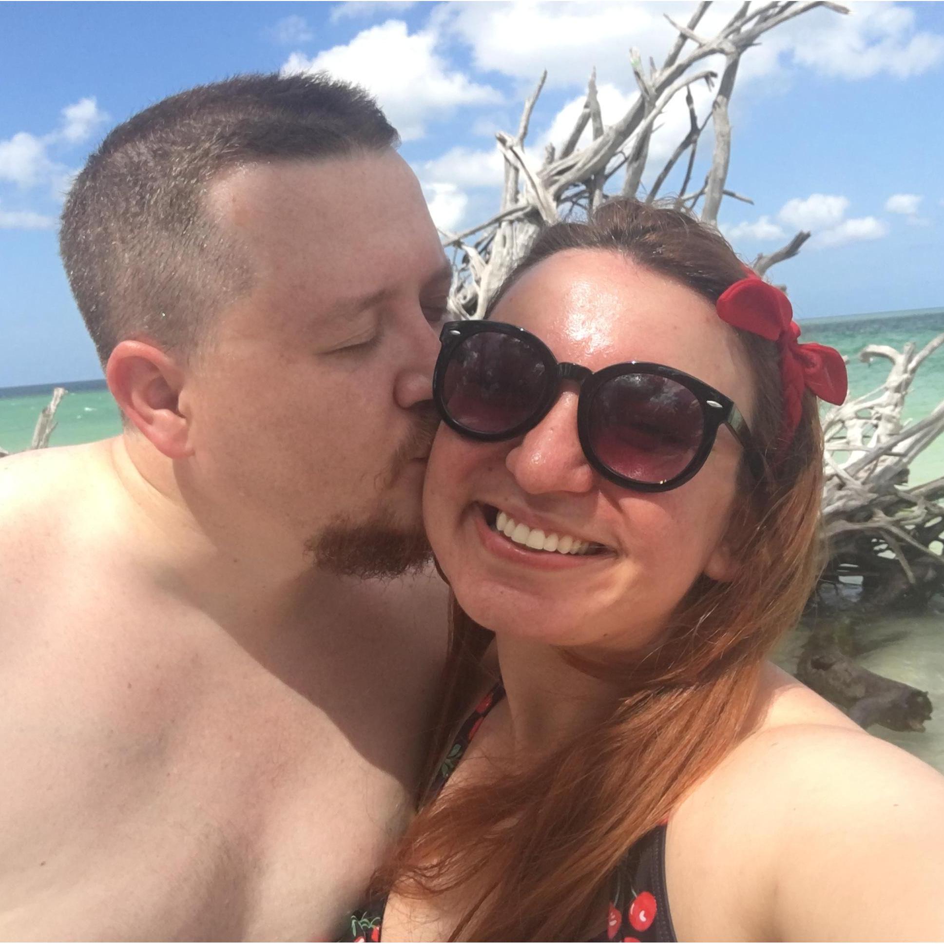 Our first beach trip to Longboat Key -- in front of the tree we would eventually be married in front of.