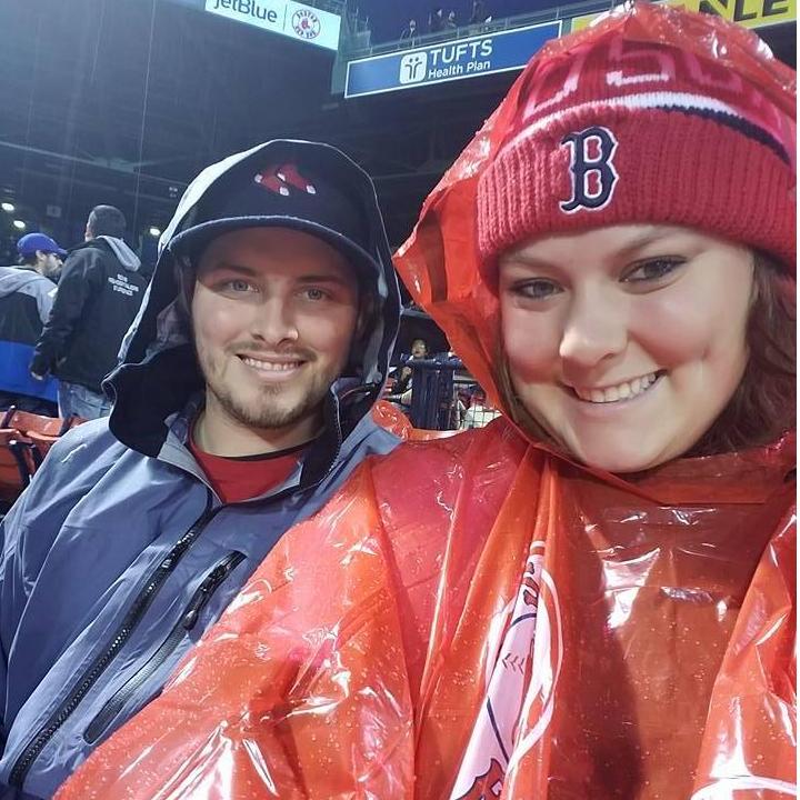 Sitting in a down pour hoping that the game doesn't get delayed