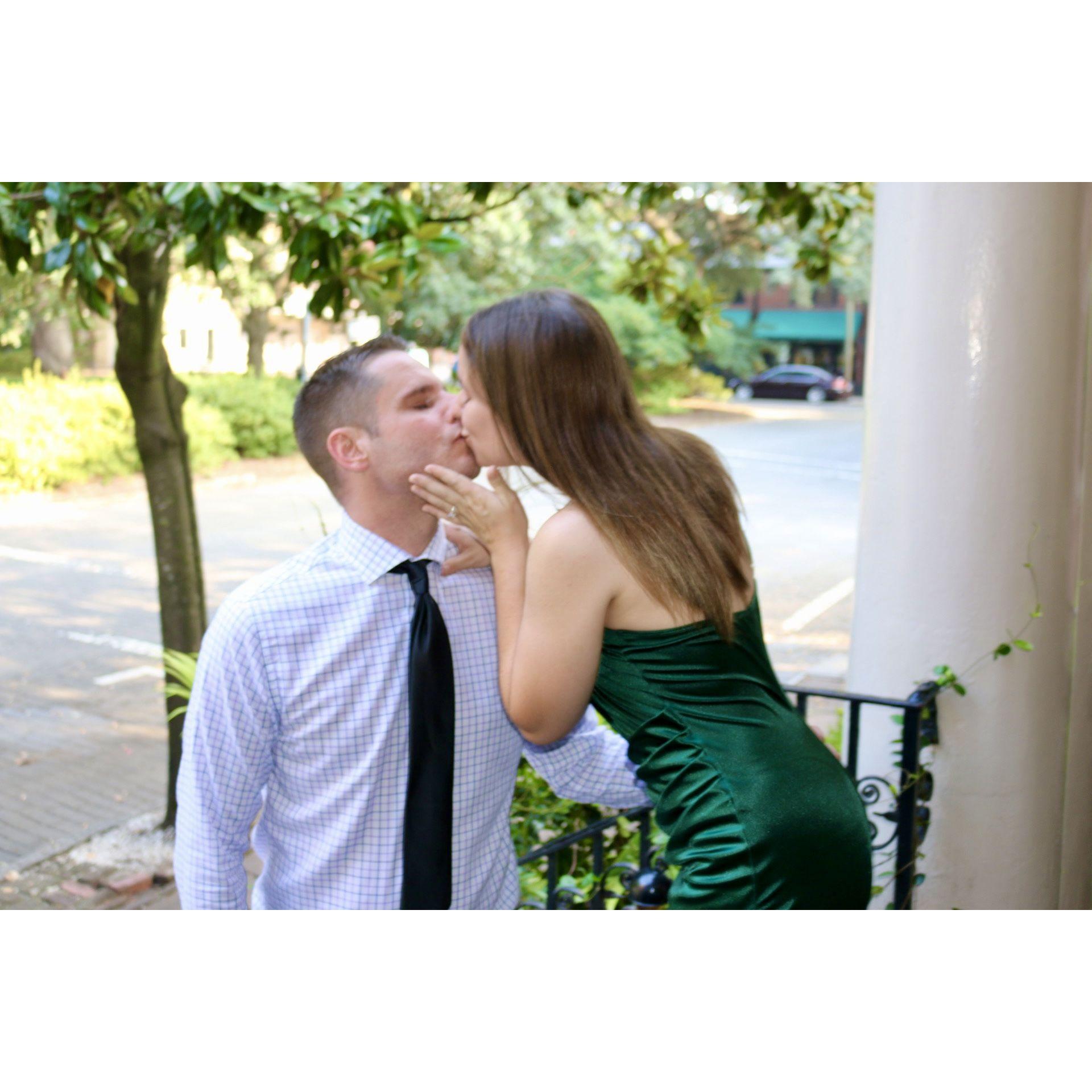 smoochin' on the steps of the Old Pink House