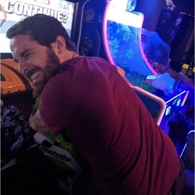 Date night at an arcade. I beat him at a motorcycle racing game, the only time I was able to that night or any other night.