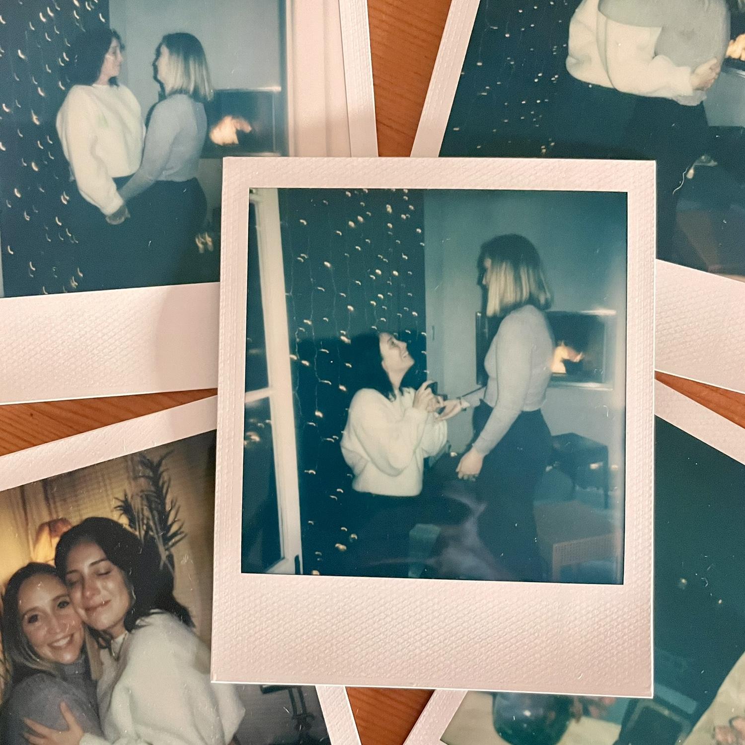 Stormy weather turned the rooftop proposal into something even more magical—rain, twinkle lights, a crackling fire, and a champagne cork that took five people to open. We’re engaged!