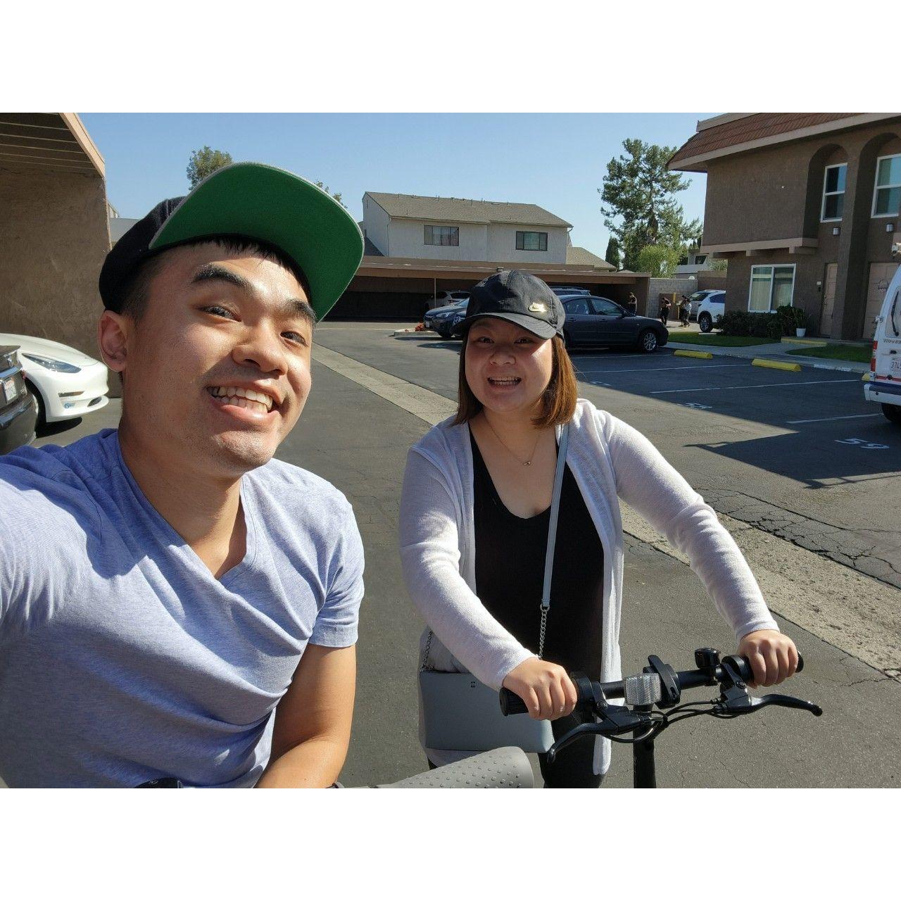 Riding our scooter and bike