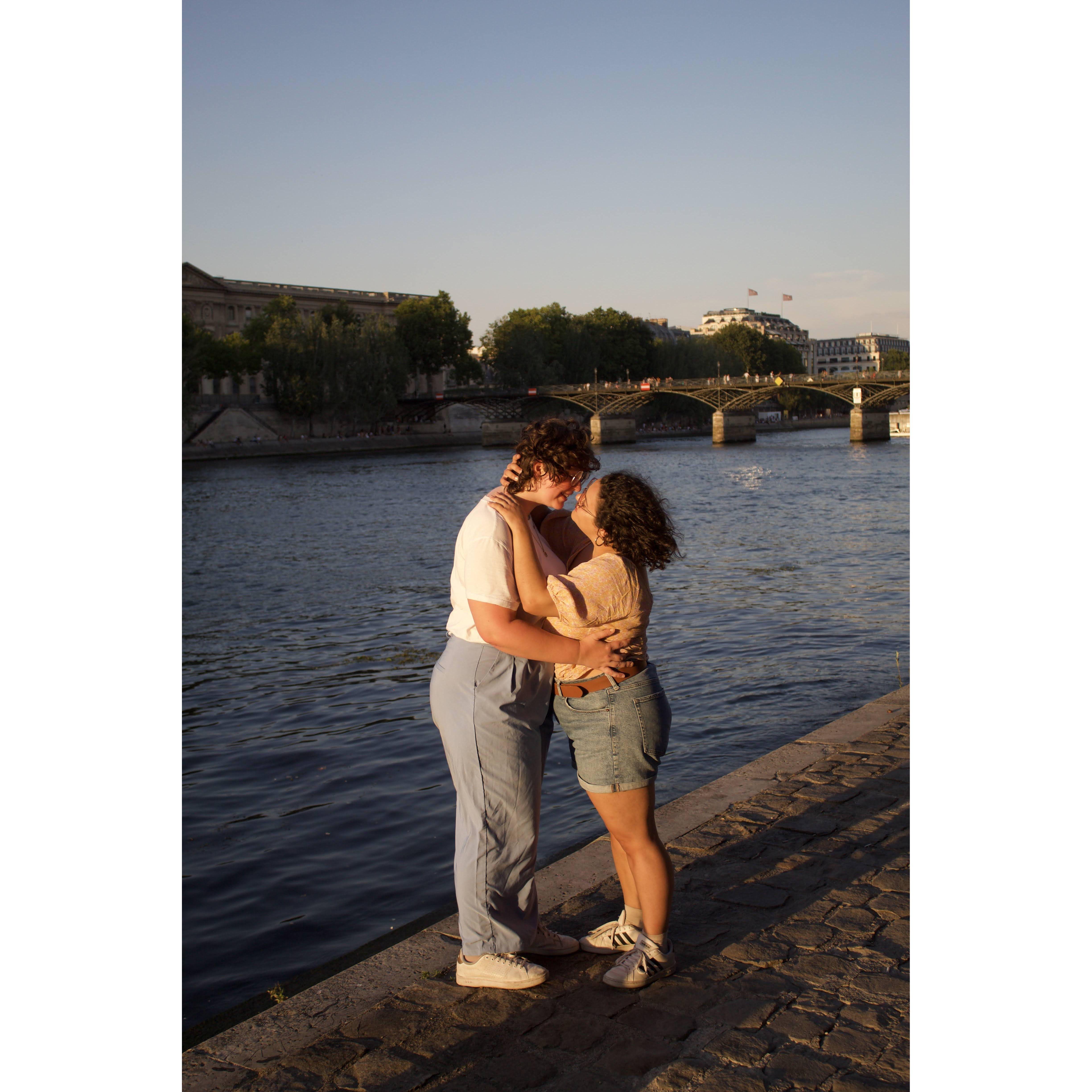 Kissing on the banks of the Seine.