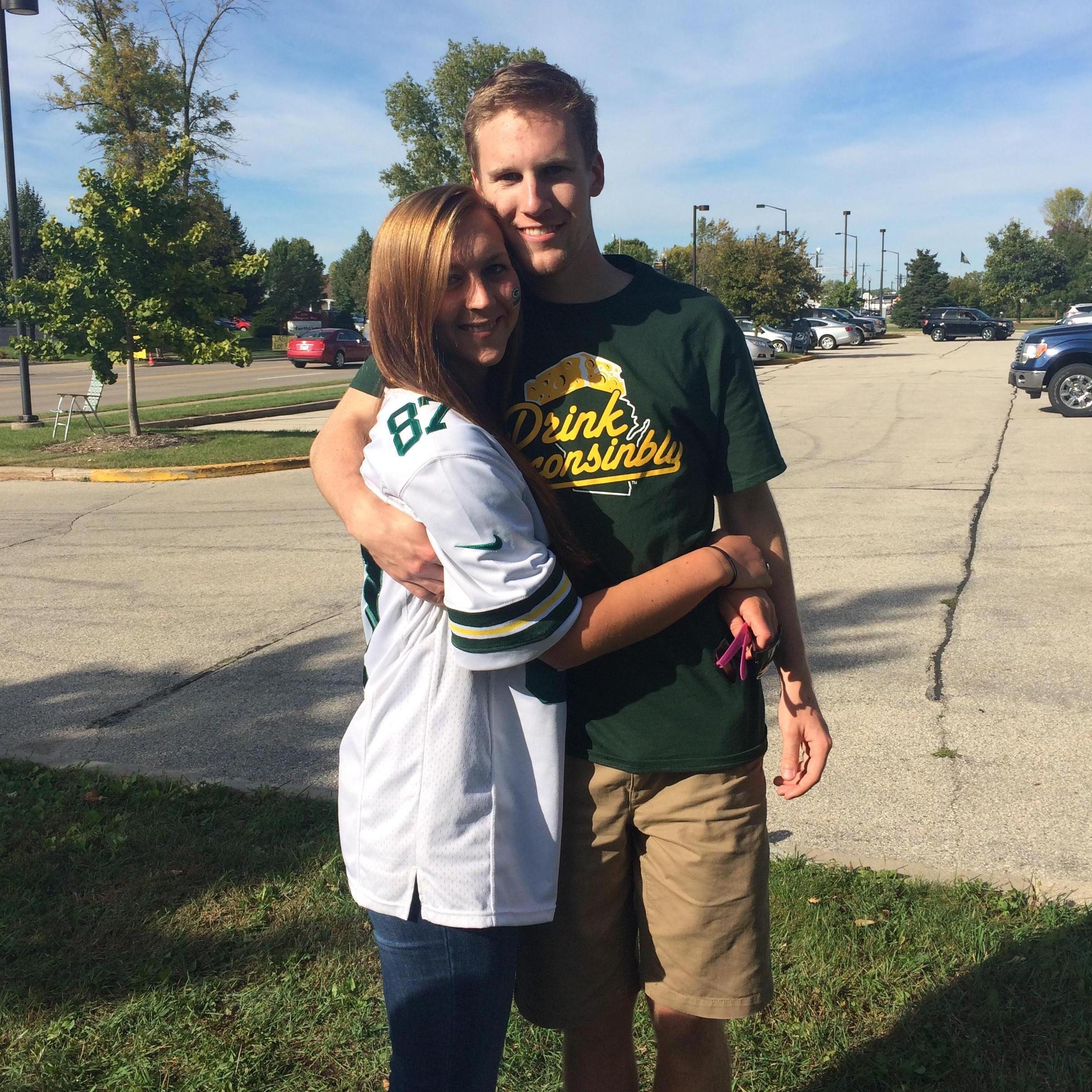 Beau surprised Laura by unsuspectingly picking her from the airport after her Oregon internship and took her to the home opener of the Packer season in 2015!