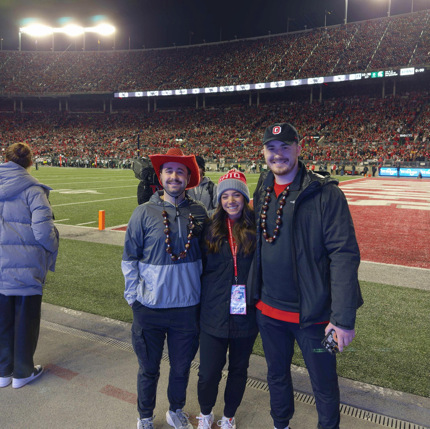 Jack and Kobe visiting Makenzie at work for the OSU vs MSU football game, 2023.