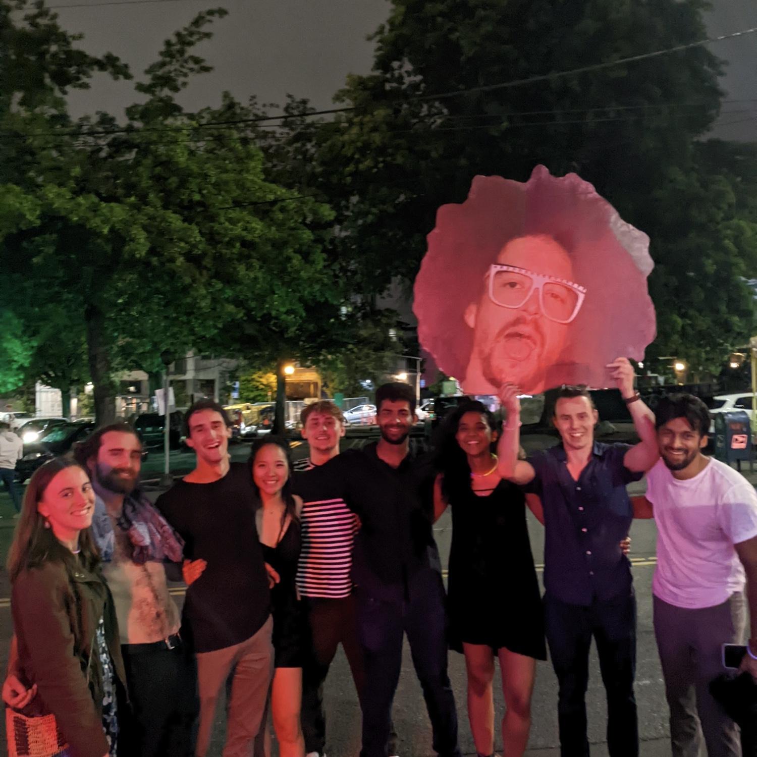 Our first photo on the night we met in June 2022 - dancing at Chop Suey. We're excited to celebrate with all the friends in this photo, except the photobomber in the stripes - no clue who he was.