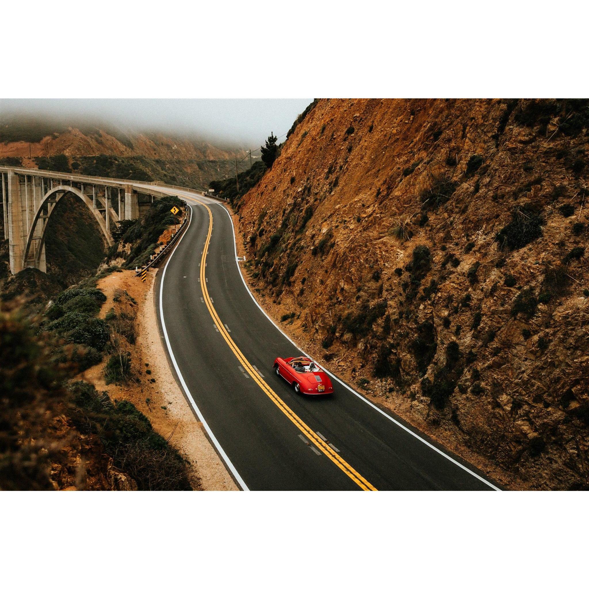 Riding along Highway 1 on a 1956 Porsche Speedster