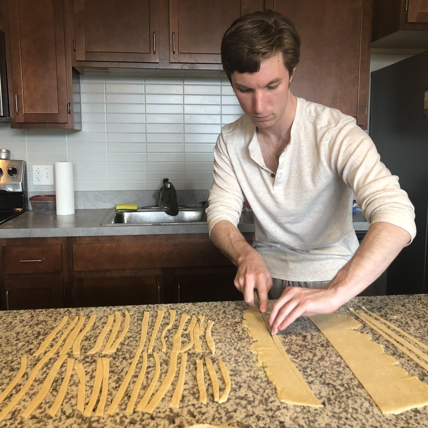 Ian making homemade pasta for Maddie shortly after they met.