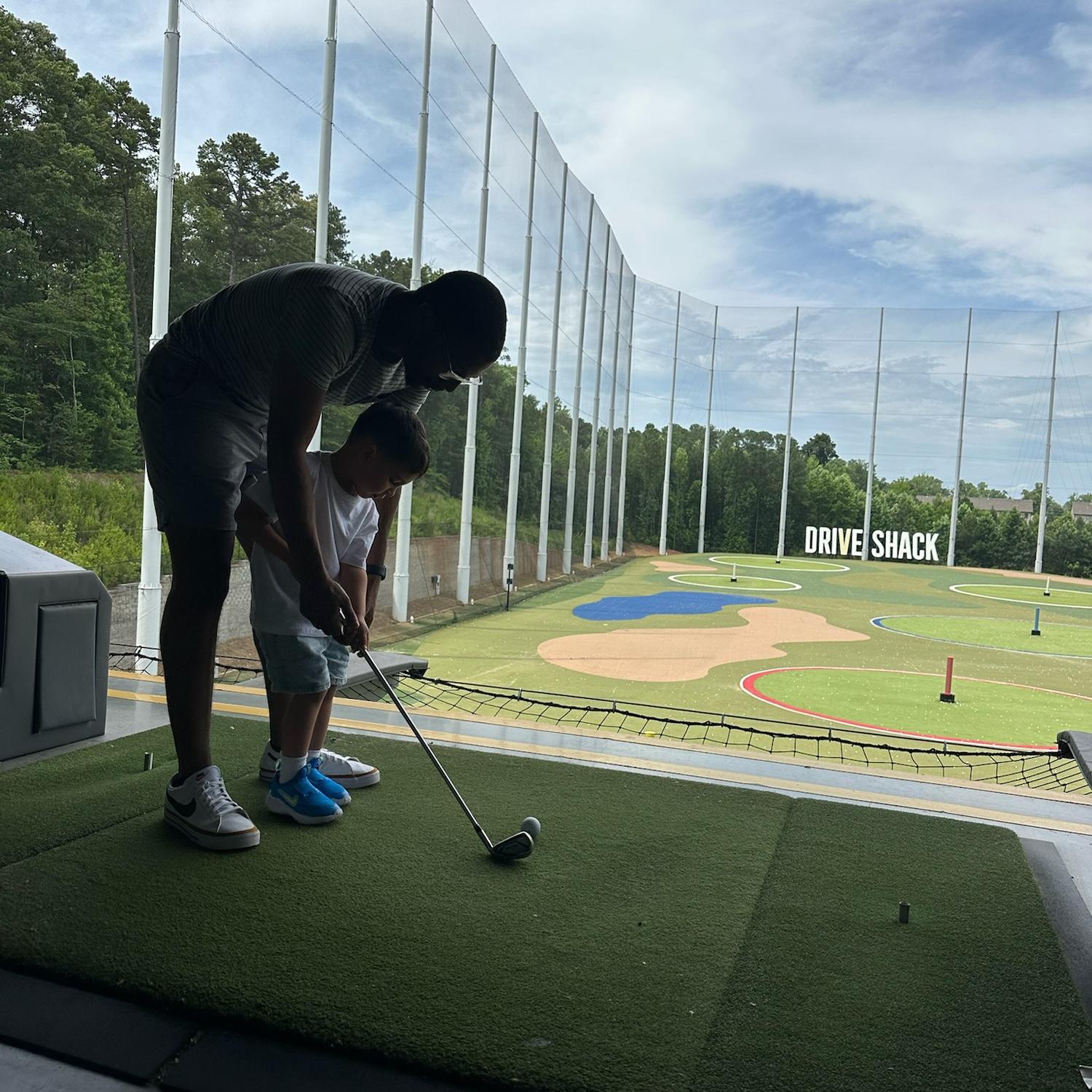 teaching Lyon how to golf ❤️