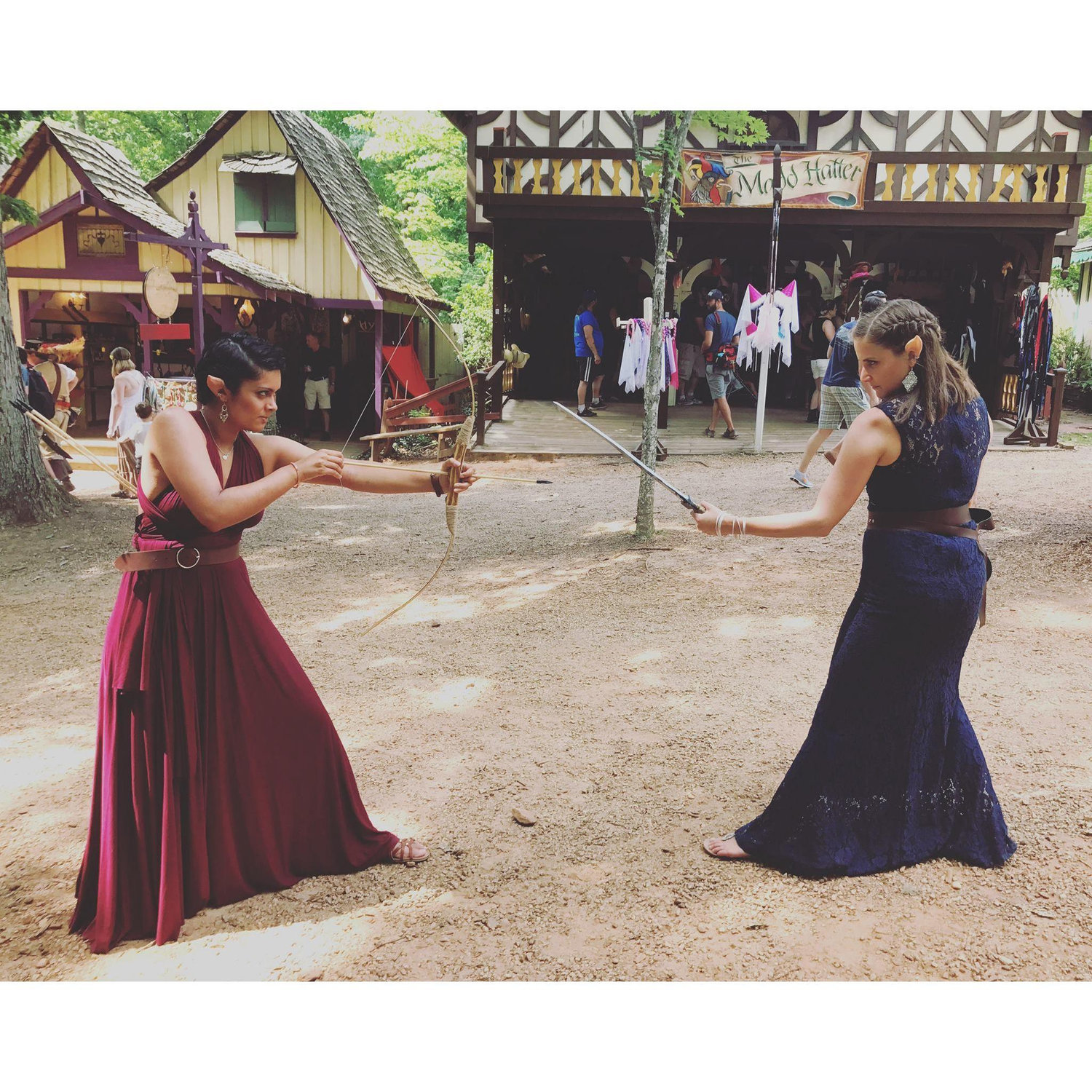 Dueling at the Renaissance Festival. They take every opportunity to wear elf ears.