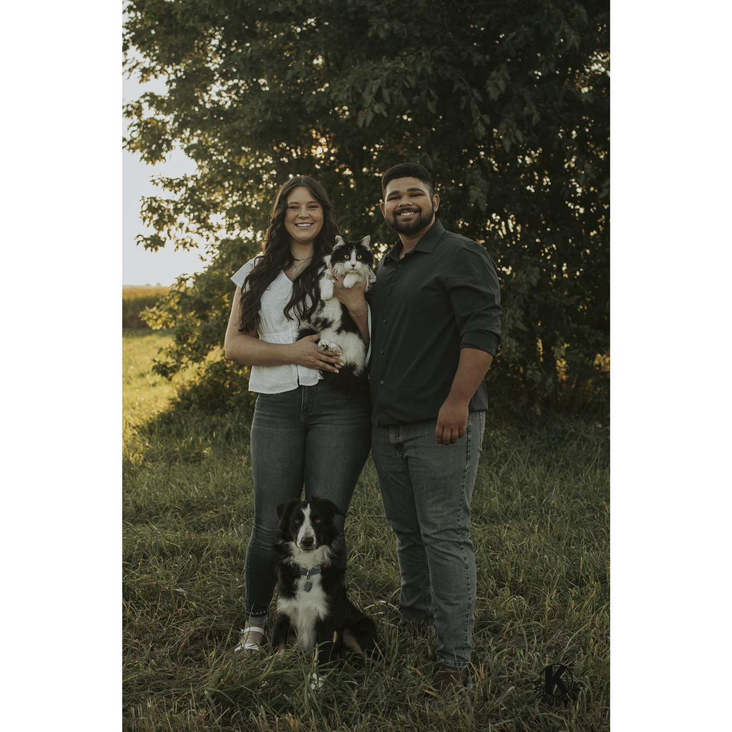 It wouldn't be us if you didn't include our fur babies. Picture is cat, Little Joe and dog, Angus.
