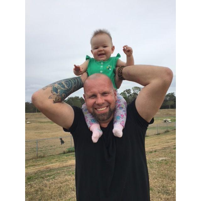 Daddy's little girl, forever his pride and joy, forging memories that last a lifetime.