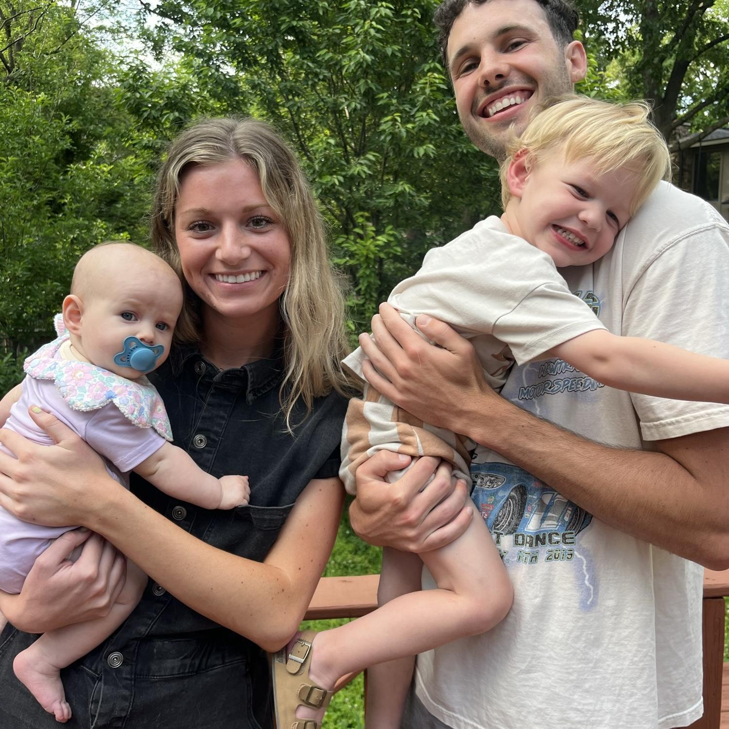 5/11/2025- Photo from Merrick's graduation party in Rogers, Arkansas. In the photo MJ is holding his niece, Gwen, and Merrick is holding his Nephew, Eben.