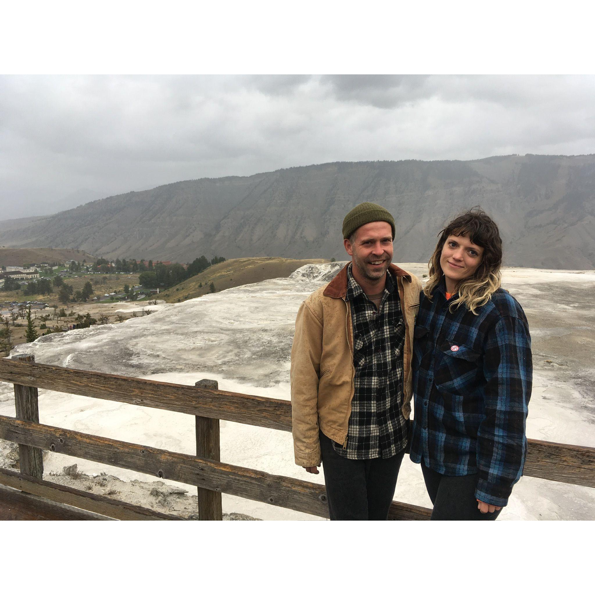 Our first photo taken together at Mammoth Hot Springs by a random stranger. Too Kool 4 Skool. Yellowstone National Park, Wyoming. 2019