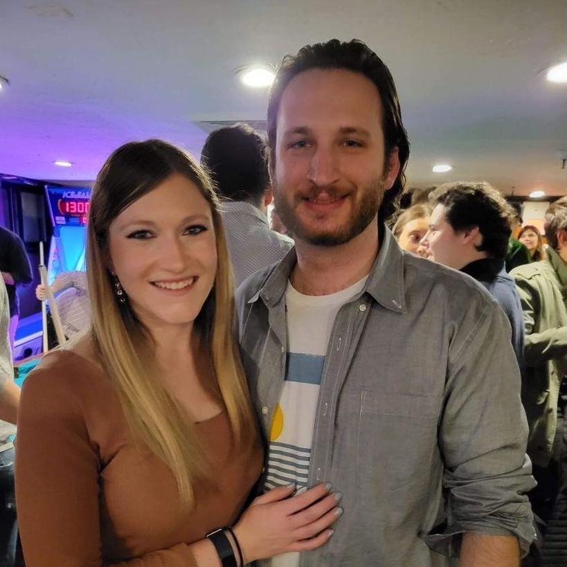 Caitlyn and Anthony at their engagement party with friends at one of their favorite bars in Boston, MA called The Hub Pub in 2022.
