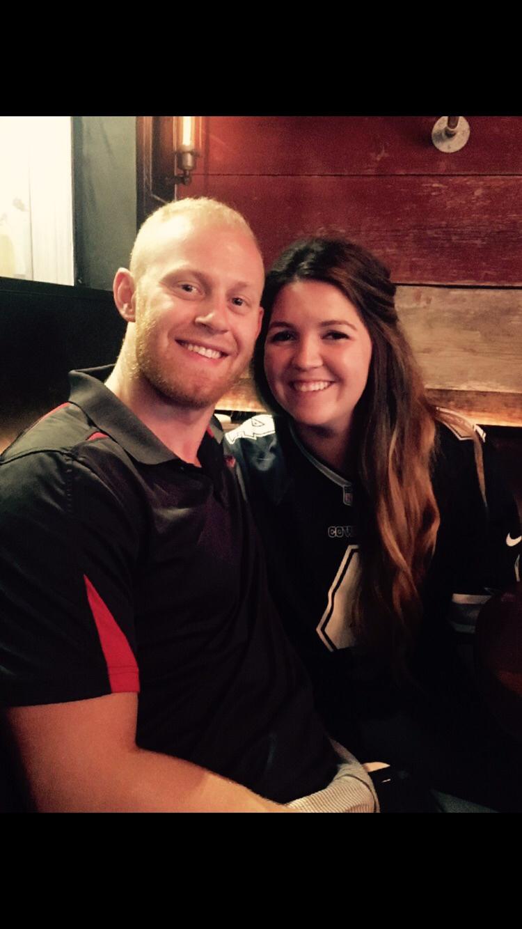 Steph & Austin's favorite picture in West Palm at their favorite bar with the BEST chicken wings. They watched a ton of football here!