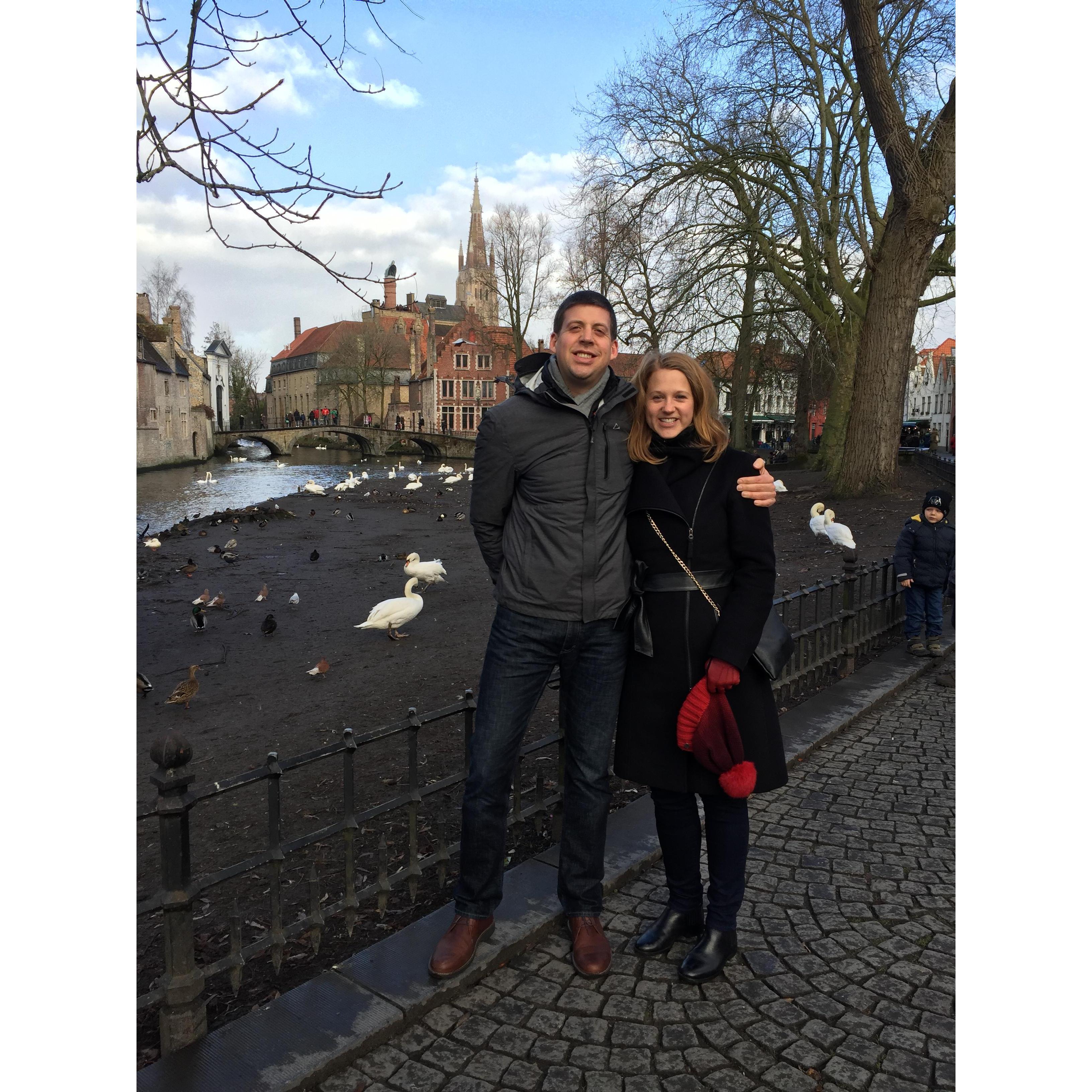 They ate chocolate and roamed the streets of Bruges, Belgium hand in hand.