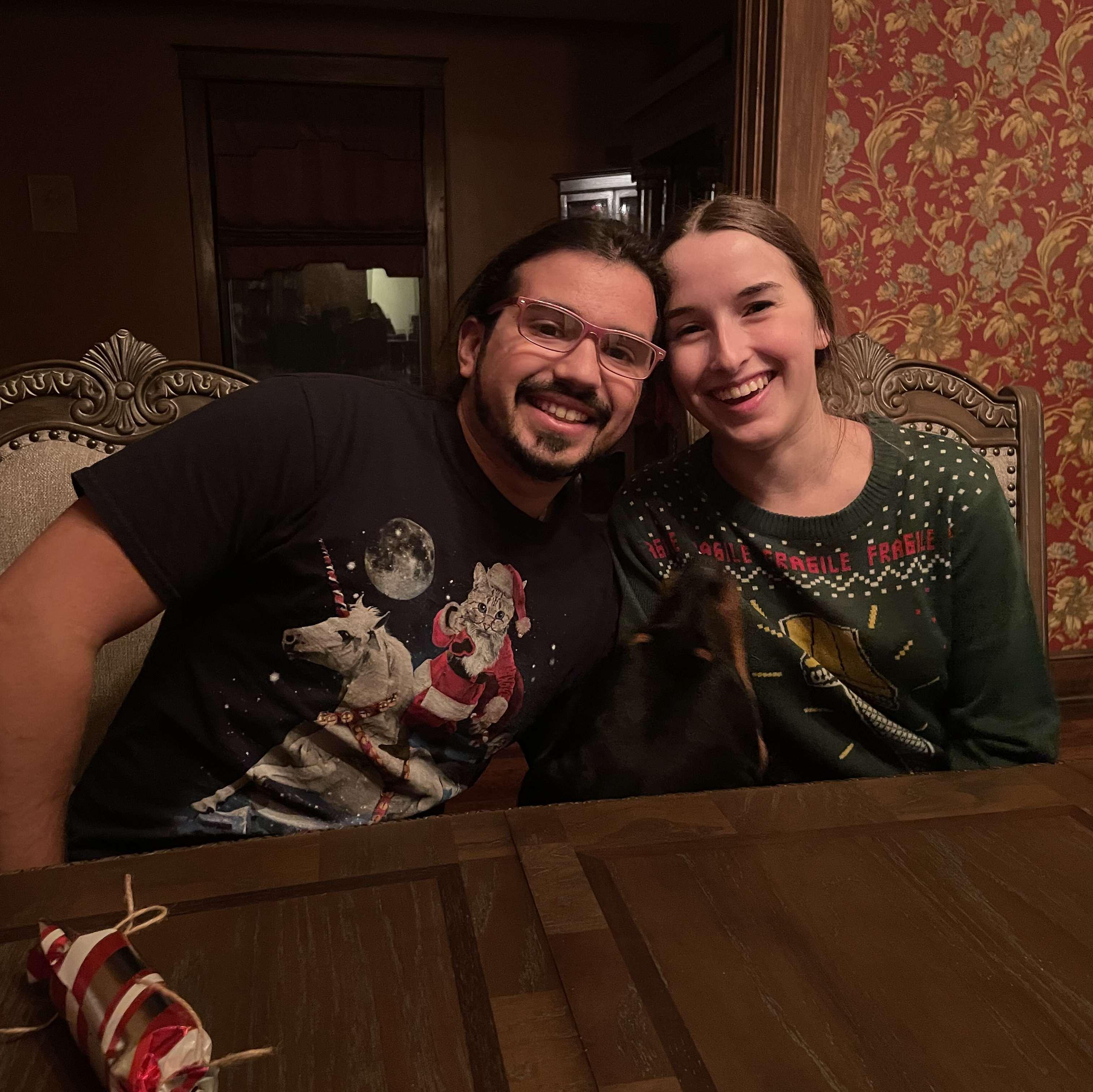 This photo was taken during our first Christmas in Memphis. We were mid-laugh due to Acadia's big head getting in the way! - December 25, 2021