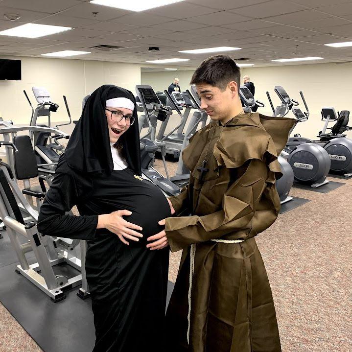 A pregnant nun and a monk walk into a bar.