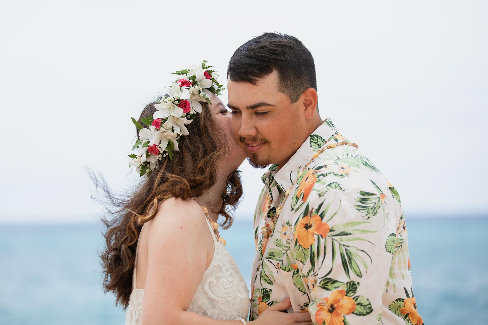 Dustin getting a quick kiss before their ceremony 2021