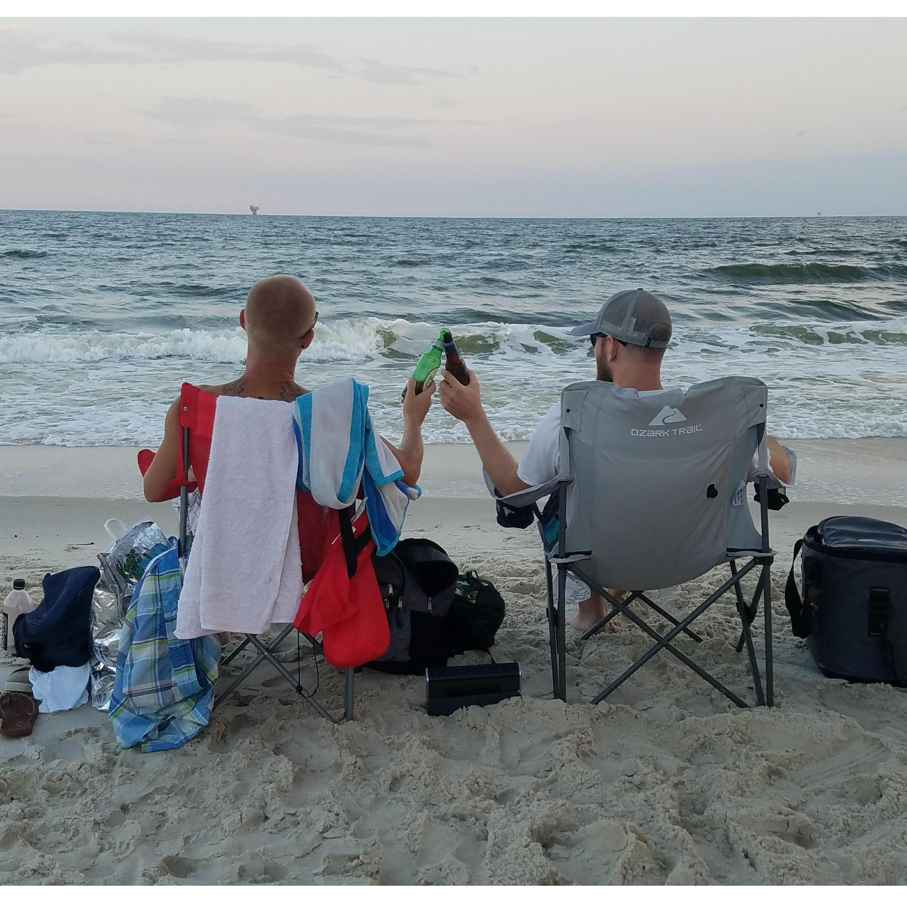 Brother-in-laws sharing a brewski together.