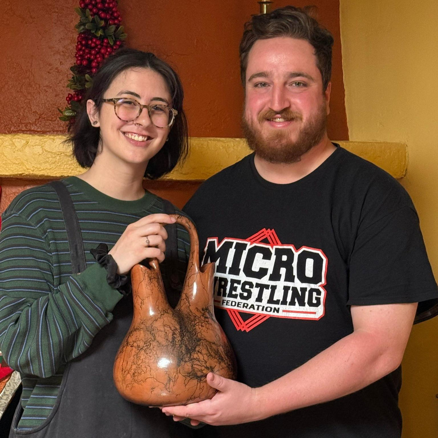 Us with his grandmother's antique Navajo wedding vase we were gifted