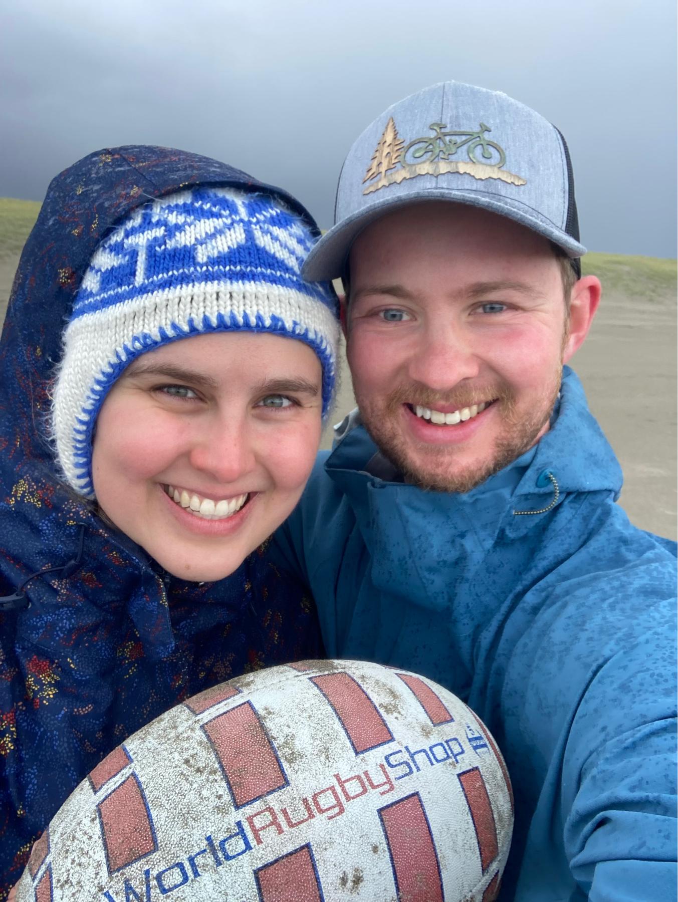 Practicing rugby on the beach.